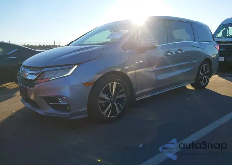 2018 Honda Odyssey Elite z USA, uszkodzony, nr VIN 5FNRL6H91JB099497